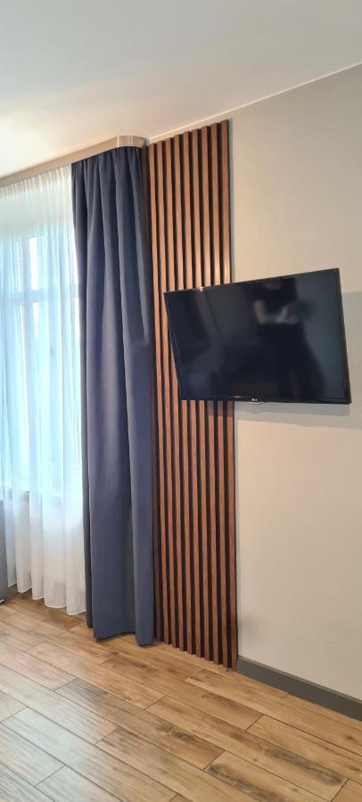 Apartsuites I Sorau Żary Exterior foto A wall-mounted television